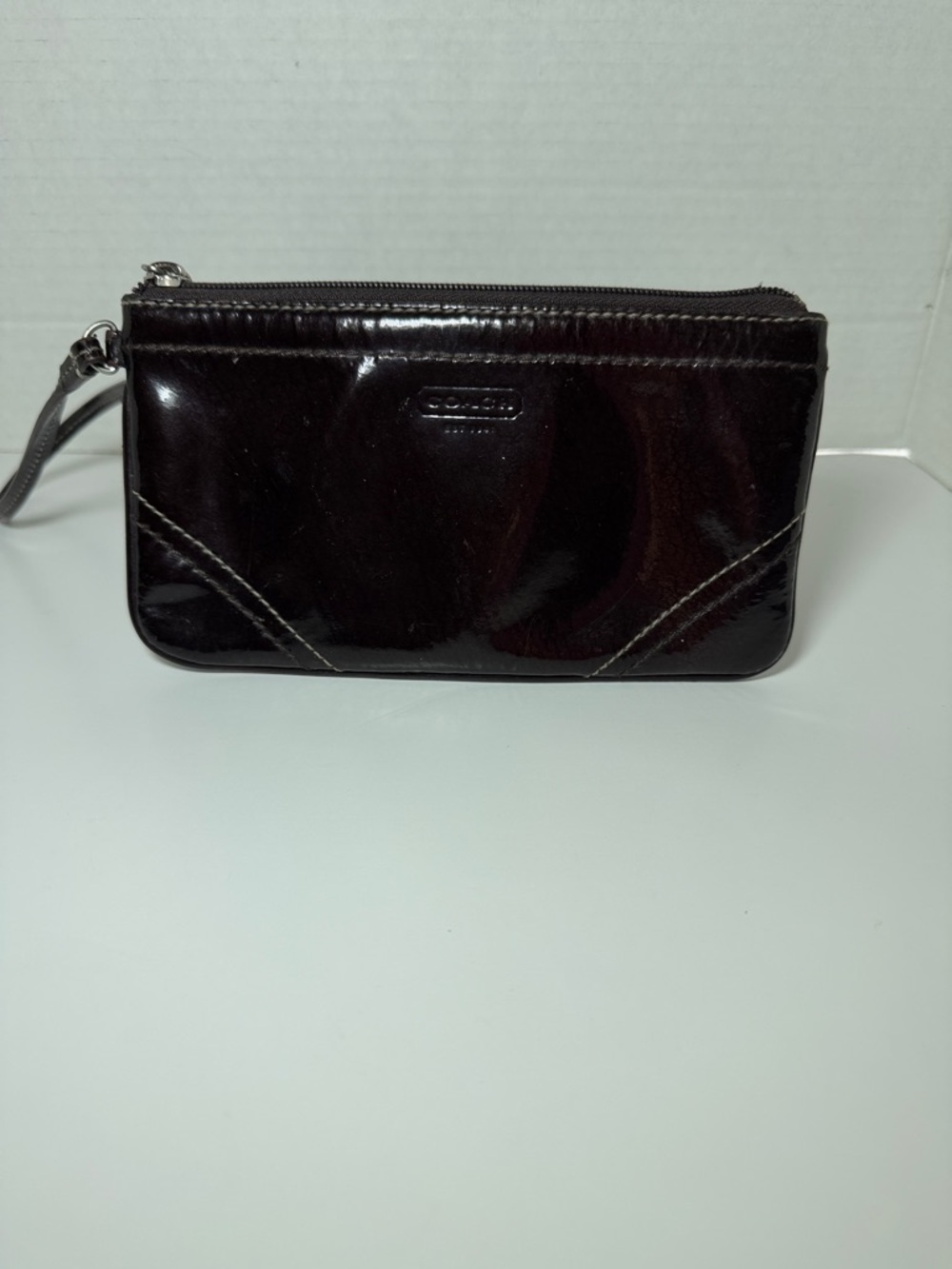 Coach Glossy Patent Leather Wristlet in Dark purple